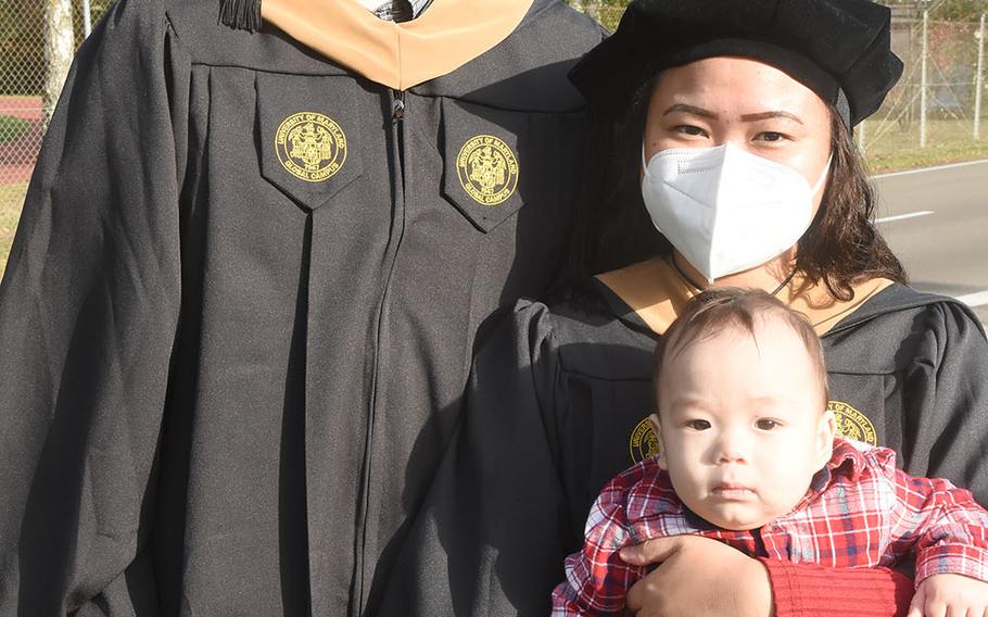 Air Force Tech. Sgt. Jordan Sheckells and his wife, Queenie May, both received a master's degree in business administration at the University of Maryland Global Campus Europe commencement on Saturday, Nov. 7, 2020, in Kaiserslautern, Germany. Queenie May had baby Eli Michael soon after finishing up her degree last year.