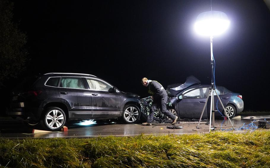 A German police officer inspects the scene of an accident in Amberg, Germany, where an 8-year-old child of a U.S. soldier was seriously injured on Nov. 19, 2020. 