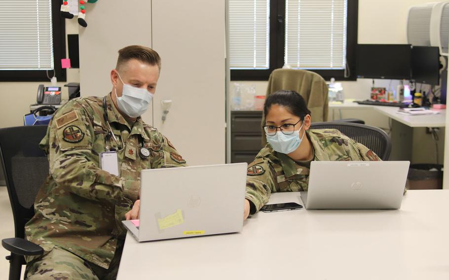 Maj. Jason Hamilton and Capt. Sarah Soriano review records at the newly redesignated Warrior Medical Clinic at Aviano Air Base, Italy. Under a recent change, doctors with the 31st Operational Medical Readiness Squadron are now responsible for care of specific units instead of the general base population.