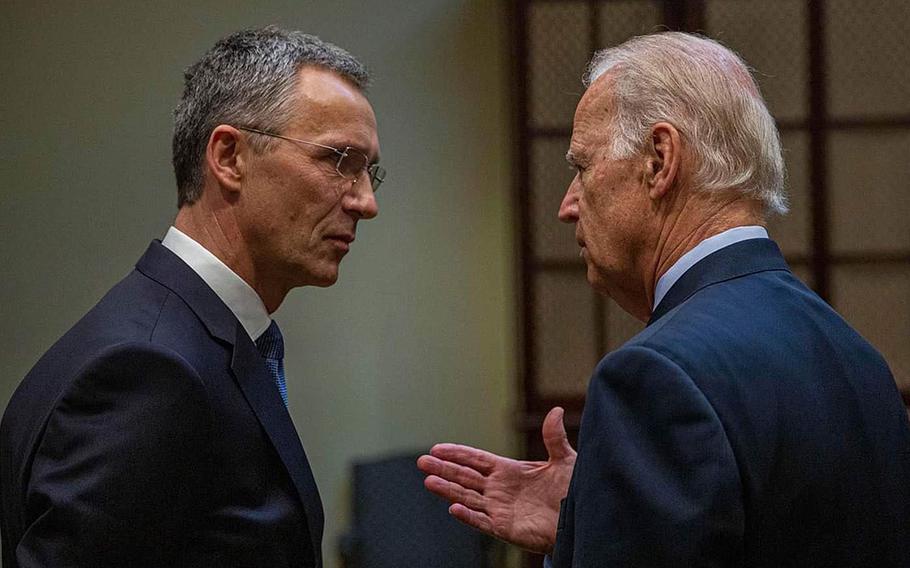 NATO Secretary-General Jens Stoltenberg and and then-U.S. Vice President Joe Biden talk in 2016. 