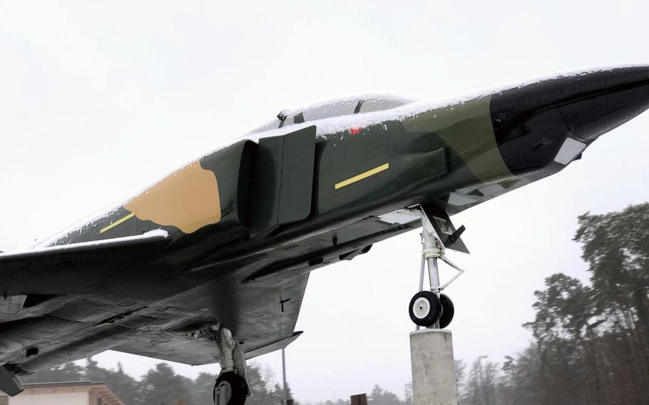 An F-4 Phantom static display on Ramstein Air Base, Germany, is dusted with snow after was the first snowfall of the season for military bases in the Kaiserslautern area, Dec. 1, 2020. 

