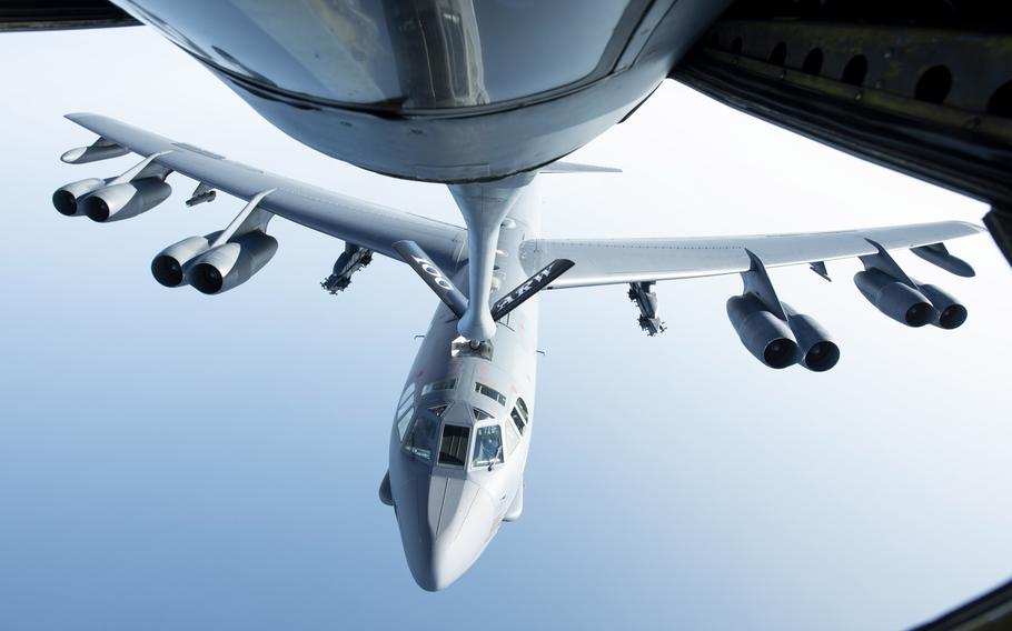 A U.S. Air Force B-52H Stratofortress, of the 5th Bomb Wing at Minot Air Force Base, N.D., flies below a KC-135 Stratotanker from the 100th Air Refueling Wing, RAF Mildenhall, England, after receiving fuel during a mission in September 2020. B-52s flew in a show of force mission over the Barents Sea Dec. 3, but one plane had to be diverted because of safety problems.