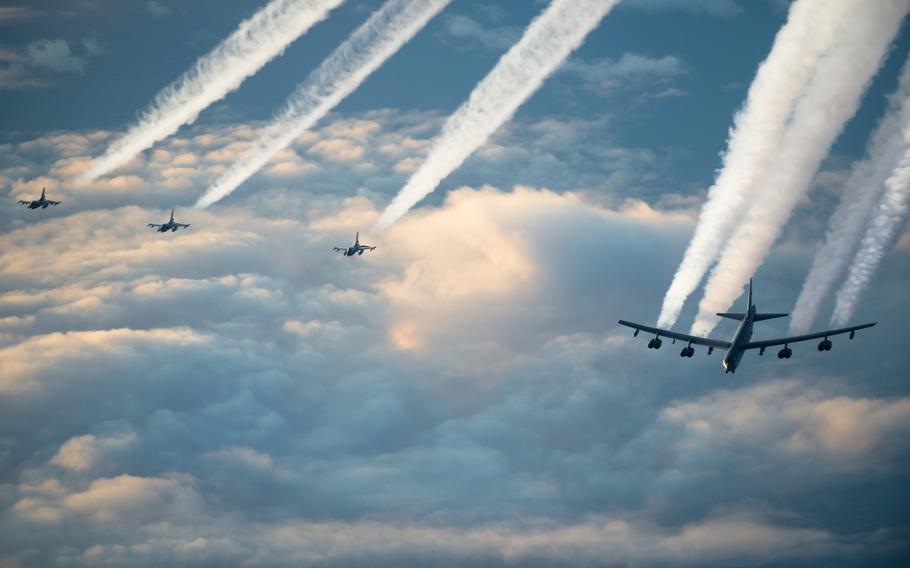 A U.S. Air Force B-52H Stratofortress and three Norwegian air force F-16 Fighting Falcons fly together toward the Barents Sea region in November 2019. B-52s flew in a show of force mission over the Barents Sea on Dec. 3, 2020, but one plane had to be diverted because of safety problems. 

