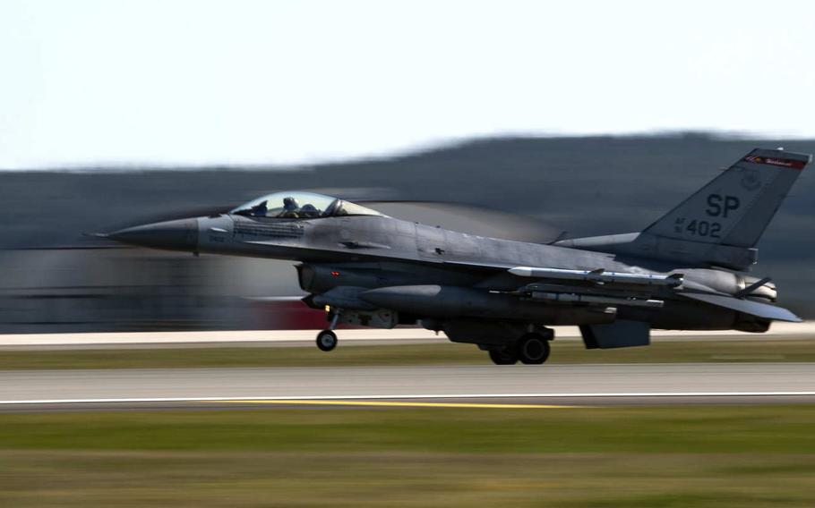 A U.S. Air Force F-16 Fighting Falcon of the 480th Fighter Squadron lands at Spangdahlem Air Base, Germany, in March 2020. The latest defense bill would halt a Pentagon plan to remove 12,000 troops from Germany. The base's F-16s were to be moved to Italy under the Pentagon plan.

