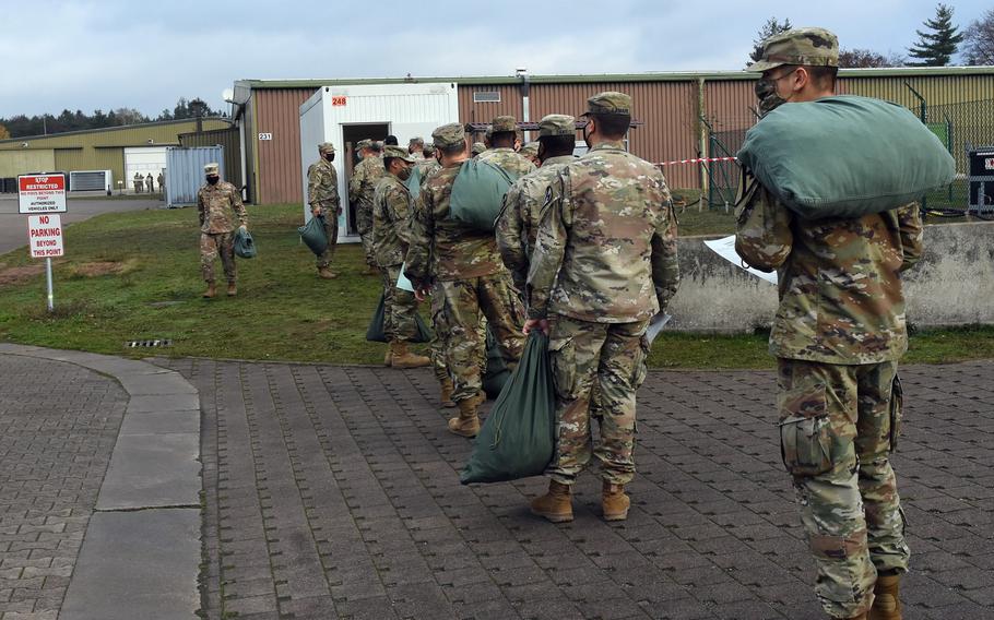 Soldiers at the Task Force Willkommen quarantine facilities on Rhine Ordnance Barracks in Kaiserslautern, Germany, wait in line to drop off their laundry, Nov. 12, 2020.

