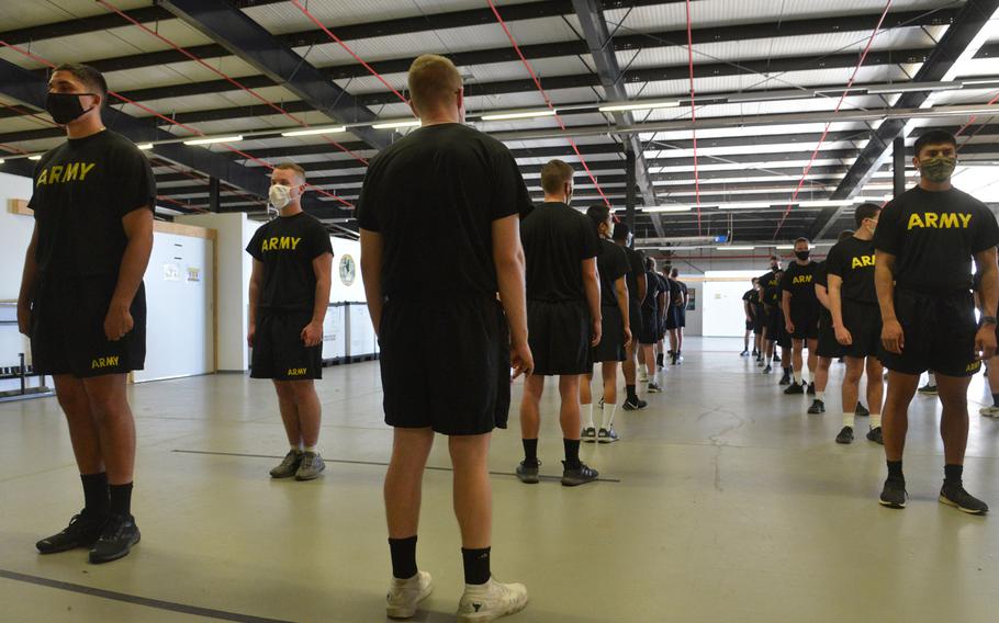 Soldiers line up to get a coronavirus test on the 10th day in isolation at the quarantine center at Task Force Willkommen quarantine facilities on Rhine Ordnance Barracks in Kaiserslautern, Germany, in September 2020.










