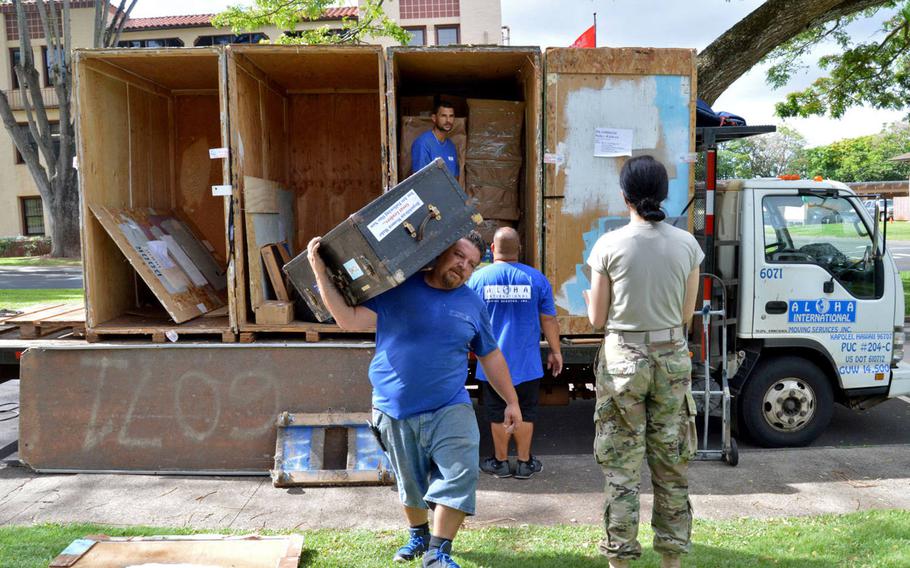 A soldier supervises the delivery of her household items in 2017. The Army will allow reservists on two-year overseas assignments to ship their household belongings, but isn't granting dual housing allowances to reservists paying mortgages in the U.S. and rent at their overseas duty location. 

