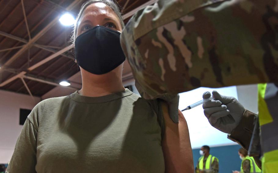 Lt. Col. Melissa Simmons, human performance flight commander at Ramstein Air Base, Germany, receives the first dose of the Moderna COVID-19 vaccine on Monday, Jan. 4, 2021, at Ramstein. Simmons said the jab felt “just like a flu shot.”
