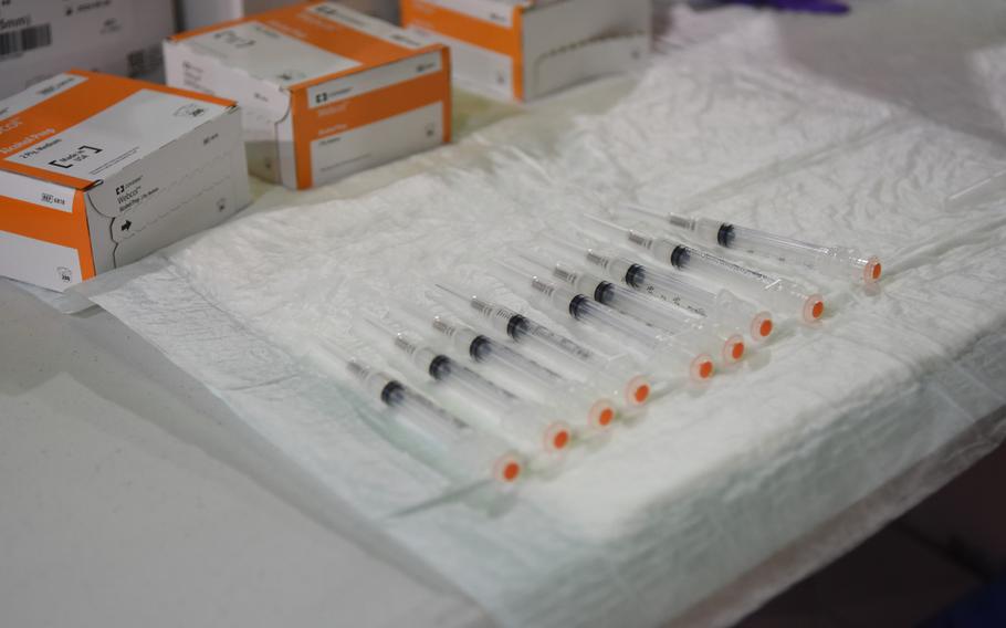 Syringes lie next to boxes of the Moderna COVID-19 vaccine at Ramstein Air Base, Germany, on Monday, Jan. 4, 2021. The 86th Airlift Wing began vaccinating medical personnel and emergency responders against COVID-19 on Monday.
