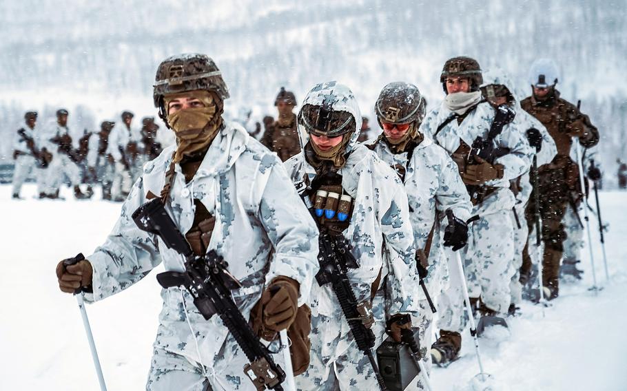 In a Nov. 20, 2020 photo, Marines with Marine Rotational Force-Europe 21.1, Marine Forces Europe and Africa, hike through snow during a cold-weather live-fire training event in preparation for Exercise Reindeer II in Setermoen, Norway. More than 1,000 Marines from Camp Lejeune, N.C., arrived in Norway in Jan. 2021 to build winter warfare skills. 