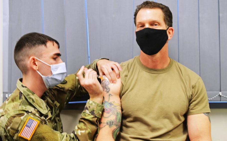 Command Sgt. Maj. Robert V. Abernethy, U.S. Army Europe and Africa, gets vaccinated with the Moderna COVID-19 vaccine at the Wiesbaden Army Health Clinic, Germany, Jan. 14, 2021. 

