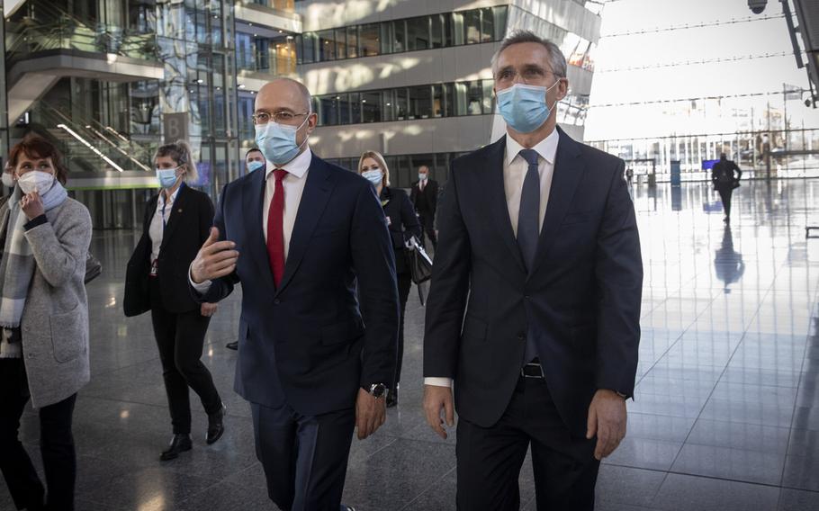 Ukrainian Prime Minister Denys Shmyha, left, meets with NATO Secretary-General Jens Stoltenberg at NATO headquarters in Brussels, Feb. 9, 2021. During the visit, Shmyhal said work will soon begin on two Ukrainian naval bases, one in the Black Sea and one in the nearby Sea of Azov.
