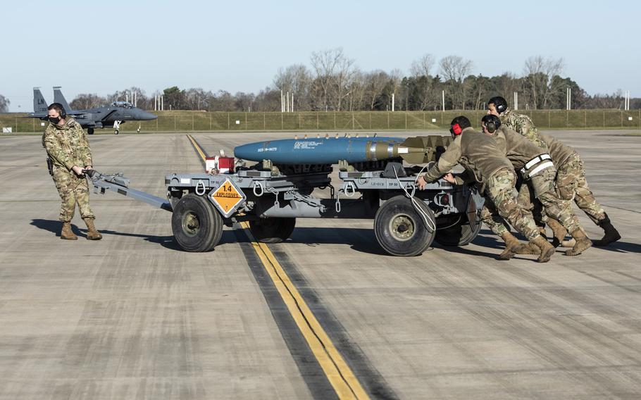 Airmen assigned to the 48th Aircraft Maintenance Squadron set up equipment during an exercise at RAF Lakenheath, England, Jan. 22, 2021. Starting March 1, 2021, the Air Force is extending overseas tour lengths from 24 to 36 months for unaccompanied airmen and Space Force members on their first permanent duty assignment at 22 of its bases in Europe and the Pacific.

