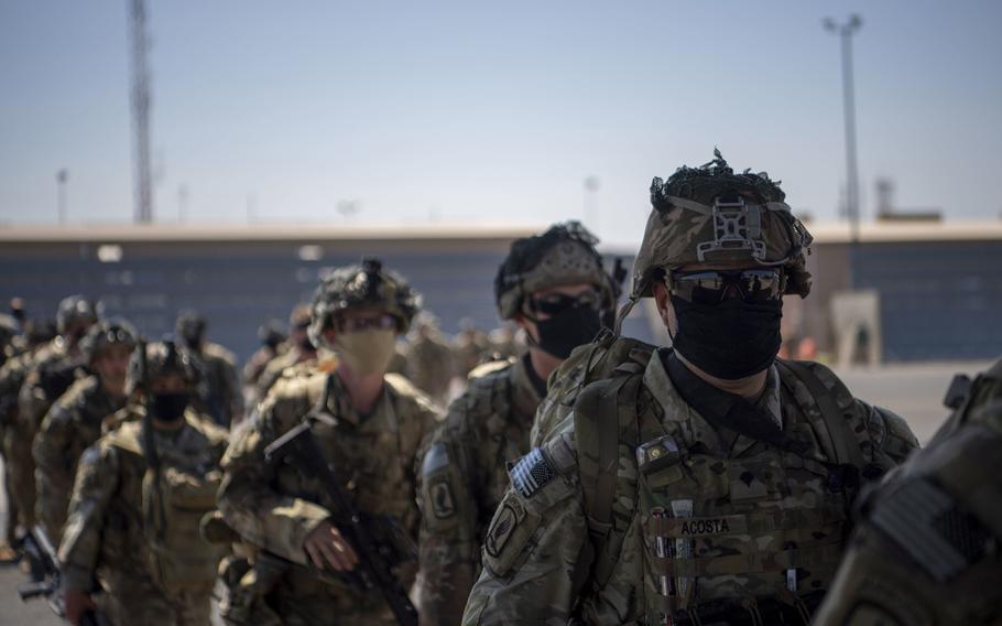 U.S. soldiers from the East African Response Force, assigned to the Combined Joint Task Force-Horn of Africa, prepare to board a C-130J Super Hercules on Jan. 21, 2021, in Somalia. Officials with the Italy-based 173rd Airborne Brigade, which participated in the deployment, expect a renewed emphasis on operations in Africa.
