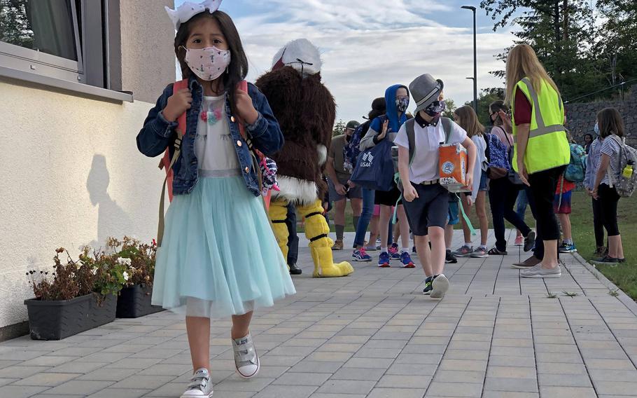 A student walks to class on the first day of school at Vogelweh Elementary School, Germany, Aug. 24, 2020. Students at most DODEA schools in Germany will return to class Monday, Feb. 22, 2021.

