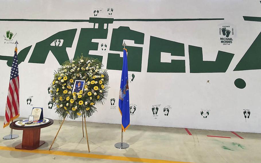 The 56th Helicopter Maintenance Unit's rescue wall, with the "Green Feet" dedication honoring fallen Tech. Sgt. Michael W. Morris, at Aviano Air Base, Italy, Feb. 19, 2021. 

