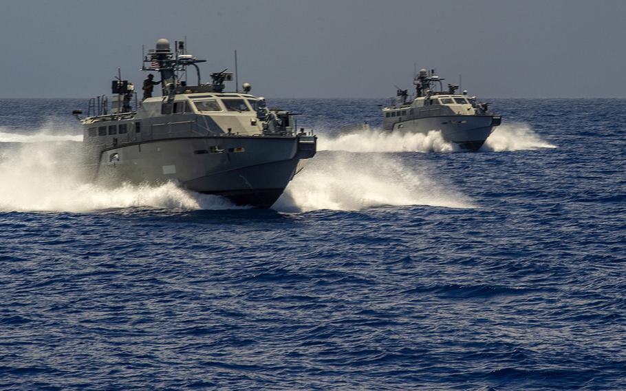 Two Mark VI patrol boats attached to Coastal Riverine Squadron 2 maneuver near Apra Harbor, Guam, in 2019. The Defense Department announced March 1, 2021, that two patrol boats are included in a $125 million military assistance package for Ukraine.