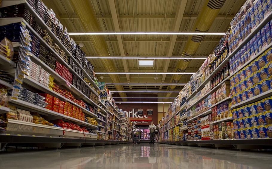 A customer walks down an aisle inside the Spangdahlem Air Base commissary in 2016. Newly enforced European Union restrictions on food imports could cause shortages of some items sold in commissaries and exchange stores.
