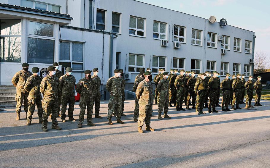 Green Berets and Serbian forces stand in formation at a training site near Belgrade, where U.S. troops are on a one-month mission in March to train with Serbian counterterrorism units.

