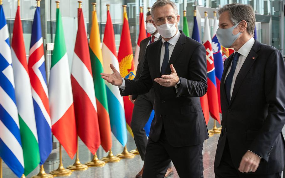 U.S. Secretary of State Anthony Blinken, right, and NATO Secretary-General Jens Stoltenberg talk at the alliance's headquarters in Brussels, March 23, 2021. Blinken is in Brussels for two days of talks with alliance foreign ministers.

