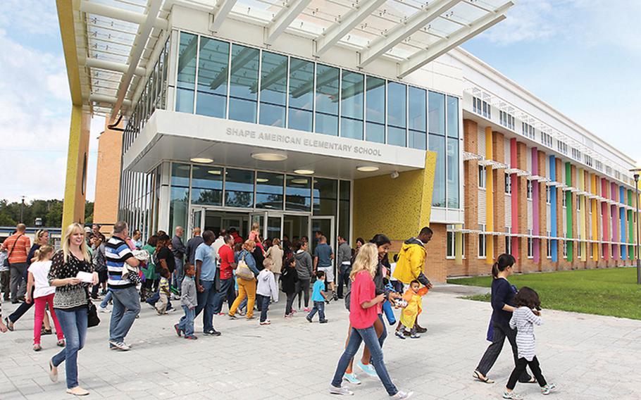 Visitors arrive at a SHAPE Elementary and Middle School open house in Mons, Belgium, in 2014. Some Department of Defense Education Activity schools in Belgium will go to remote learning starting March 29, 2021, following Belgium's decision to close schools and restrict nonessential business after an increase in coronavirus cases, school officials announced March 26.


