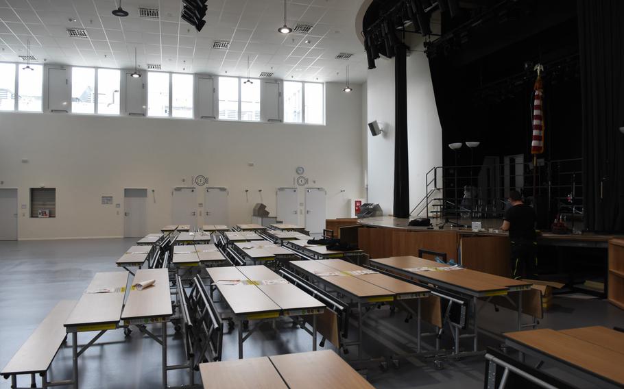 A room with a stage and acoustic sound boards on the walls doubles as a performance hall and cafeteria in the new Kaiserslautern Elementary School at Kapaun Air Station in Kaiserslautern, Germany. The building is slated to open Monday.

