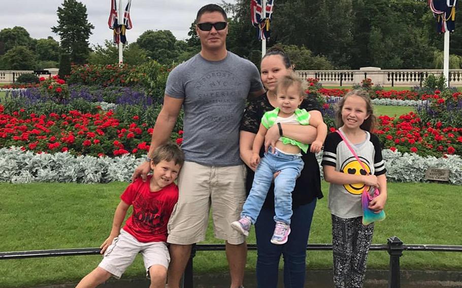 Tech. Sgt. Michael W. Morris with wife Amanda, and children Brayden, Matehya and Makenna in England. An autopsy conducted by Italian authorities concluded that Morris’ death on Jan. 12, 2021, was due to COVID-19 complications, Aviano Air Base officials said.
