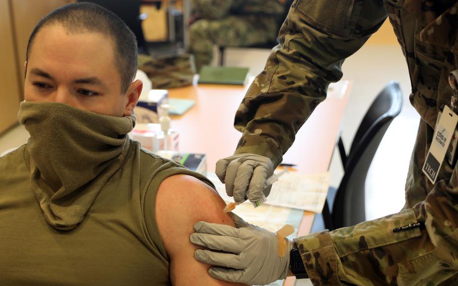 Capt. Colin Simsarian, 10th Army Air and Missile Defense Command, receives a COVID-19 vaccination at Landstuhl Regional Medical Center in January 2021. LRMC will begin vaccinating Defense Department Tier 1C beneficiaries at high risk of getting the coronavirus starting April 16, the hospital said.

