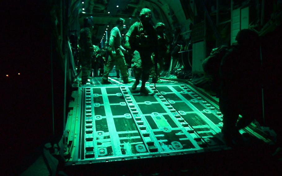 U.S. Army soldiers, assigned to the East Africa Response Force, 101st Airborne Division, exit a C-130J Super Hercules, at Manda Bay Airfield, Kenya, on Jan. 5, 2020. Defense Secretary Lloyd Austin has ordered an independent review of the attack that day by militants that killed three Americans and wounded at least three others at the small U.S. base.
