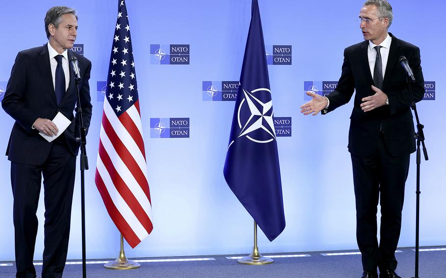 NATO Secretary General Jens Stoltenberg, right, and United States Secretary of State Antony Blinken address a media conference at NATO headquarters in Brussels, Wednesday, April 14, 2021. 