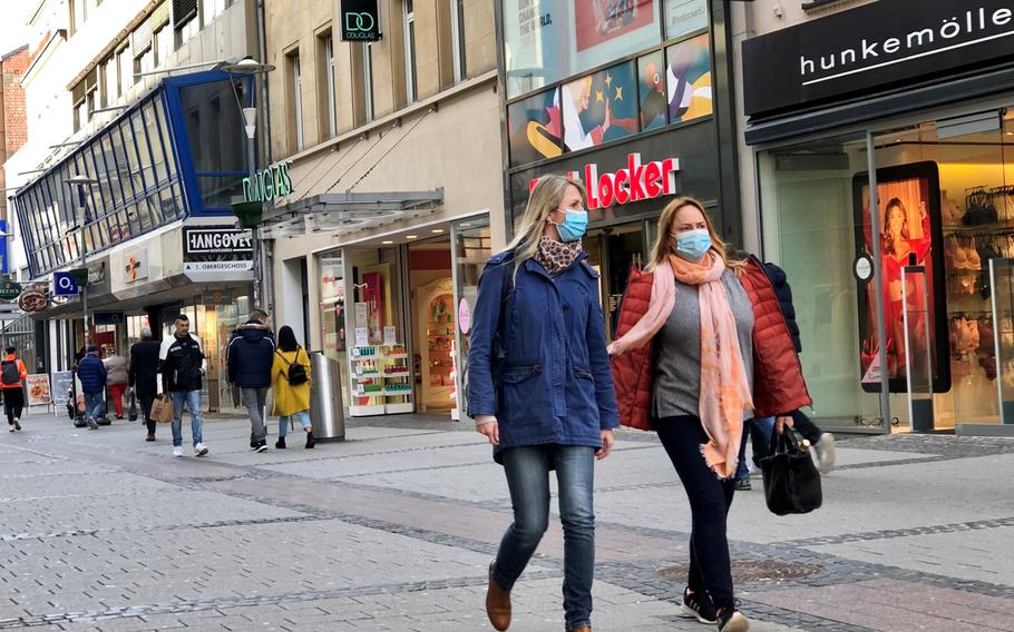 People walk past open shops in the pedestrian zone of Kaiserslautern, Germany, on March 23, 2021. A U.S. military-approved, anonymous survey offered by the state of Rheinland-Pfalz is gathering data on what American families want to do during their time in Germany.

