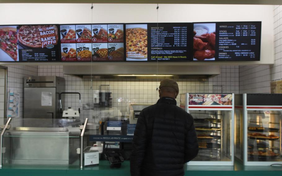 Marvin Mens orders lunch at Anthony's Pizza at Ramstein Air Base, Germany, on Wednesday, April 21, 2021. Mens said he chose Anthony's to avoid waiting in line. The Exchange pizzeria is the last Anthony's in Europe and will close May 1.