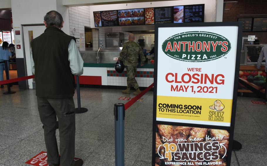 A few customers wait in line for lunch at Anthony's Pizza inside the food court at Ramstein Air Base, Germany, on Wednesday, April 21, 2021. The Exchange-brand pizzeria, which has dished out pizza for more than 30 years, is closing its last Europe location May 1.
