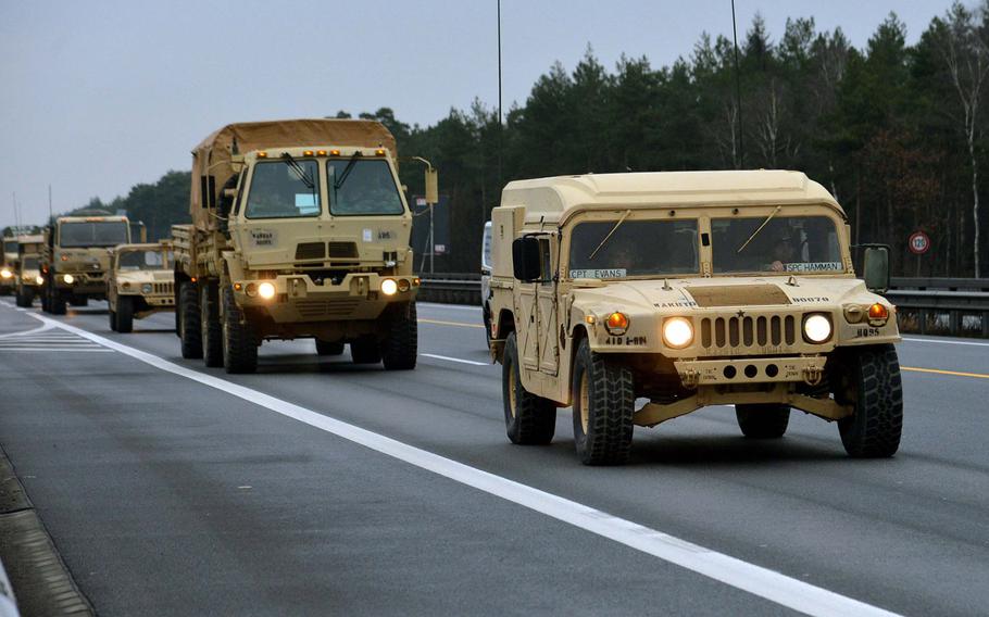 A convoy of vehicles of 3rd Armored Brigade Combat Team, 4th Infantry Division drives along a German autobahn in 2017, on its way to Poland. The U.S. has joined a European Union effort to consider ways to move troops across European national borders faster. 

