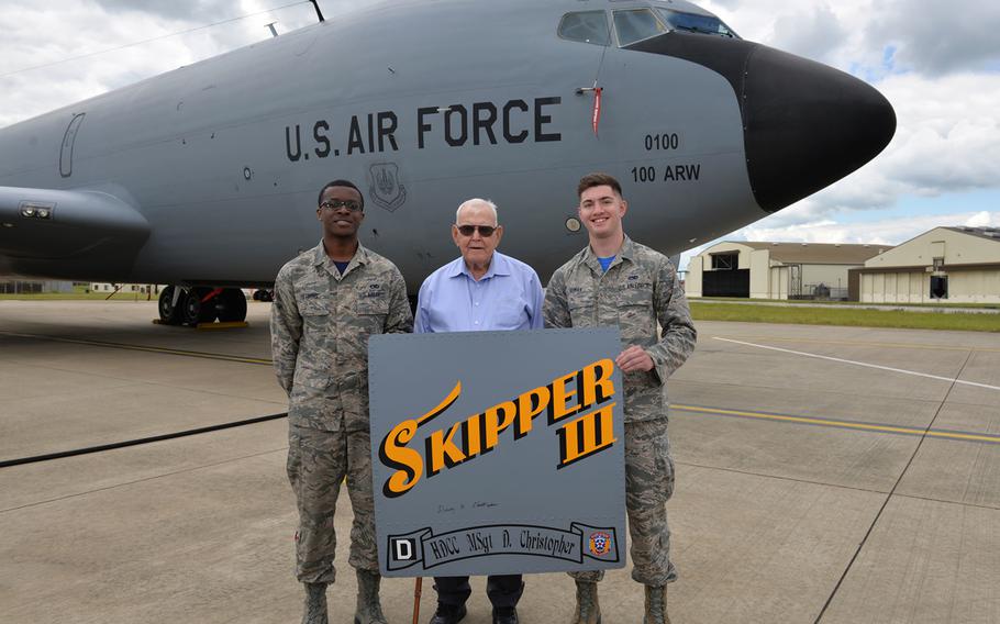 U.S. Air Force Airman 1st Class Isaiah Herring, left, 100th Aircraft Maintenance Squadron maintainer, and  Airman Camden Roman, 100th Maintenance Squadron maintainer, pose for a photo with retired Master Sgt. Dewey Christopher, at RAF Mildenhall, England, June 21, 2019. 