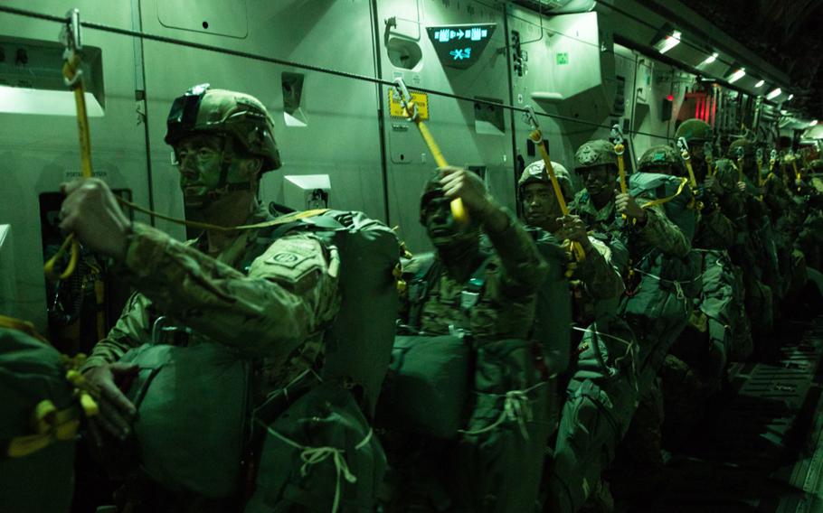 Paratroopers assigned to 3rd Brigade Combat Team, 82nd Airborne Division, wait to exit a C-17 Globemaster III bound for Estonia during Exercise Swift Response 21, May 7, 2021. 
