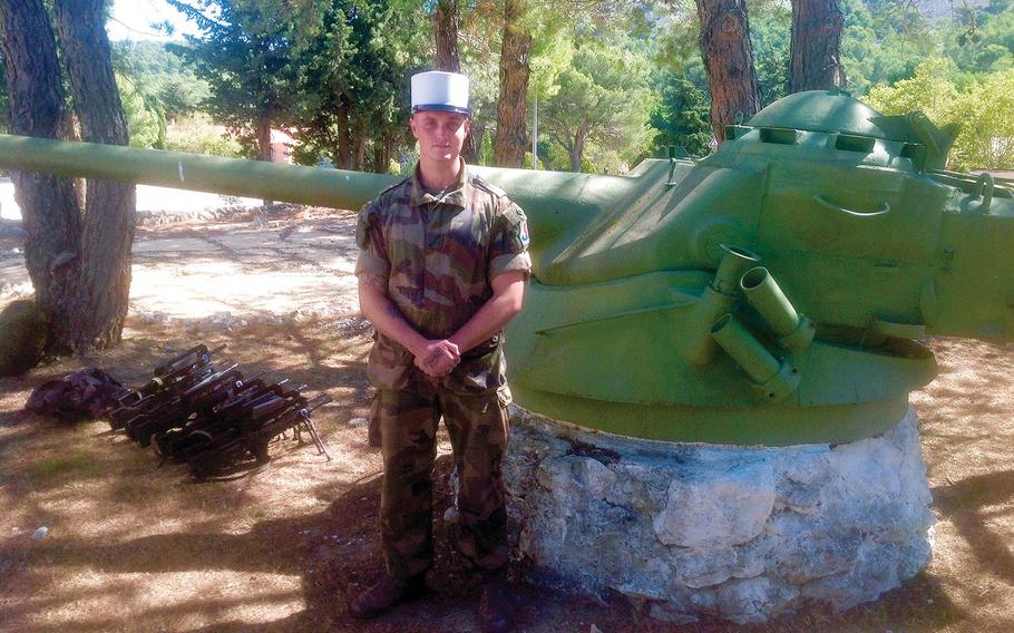 Edward, an American member of the French Foreign Legion, takes a break during a weapons drill in September at Camp de Carpiagne, home base of the Legion’s First Cavalry Regiment. The 24-year-old former U.S. Marine was given a new identity upon joining the Legion. He now operates a Milan anti-tank missile.