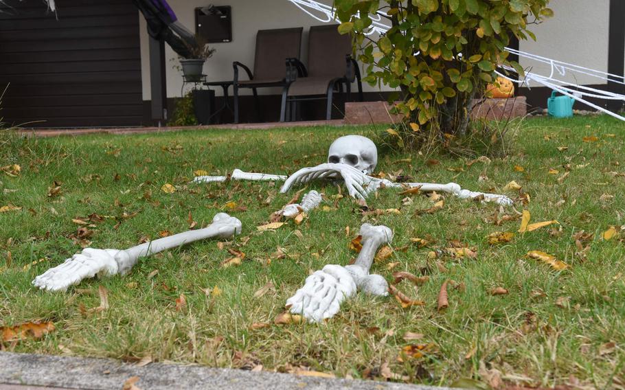 A skeleton decorates a yard on Ramstein Air Base, Germany, Oct. 16, 2020. Many houses on base are already decked out for Halloween but there will be no trick-or-treaters this year.  The Air Force announced last week that door-to-door trick-or-treating in family housing on base in the Kaiserslautern area is prohibited due to the pandemic.

