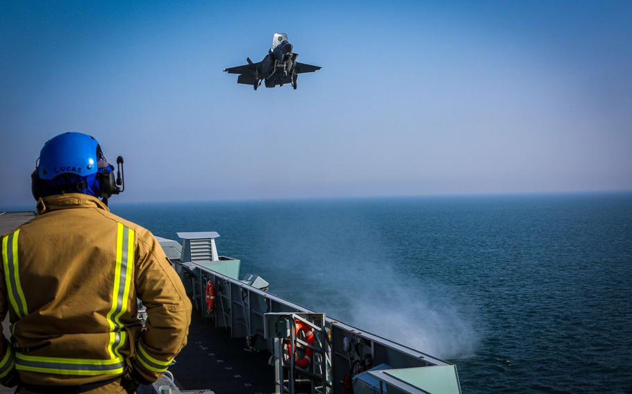 An F-35B Lightning II with Marine Fighter Attack Squadron 211 prepares to land on board HMS Queen Elizabeth off the coast of the United Kingdom on Sept. 22, 2020. The Marines of the ''Wake Island Avengers'' joined the U.K.’s 617 Squadron, ''The Dambusters,'' aboard the 65,000-ton British carrier to form the largest 5th-generation carrier air wing in the world.

