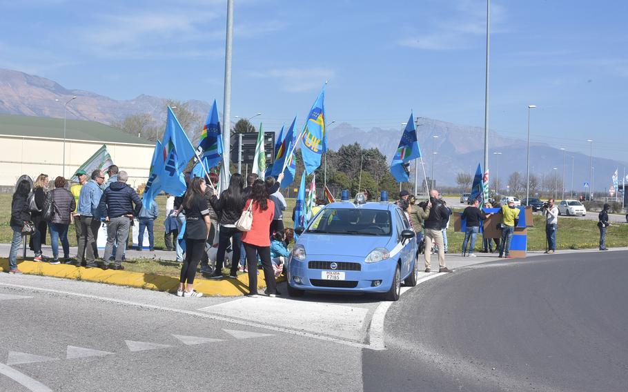 Italian national employees gathered at the traffic circle near the main gate of Aviano Air Base on Saturday, March 30, 2019, to demonstrate their unhappiness with the base on several issues. Local police were on hand to ensure access in and out of the base.