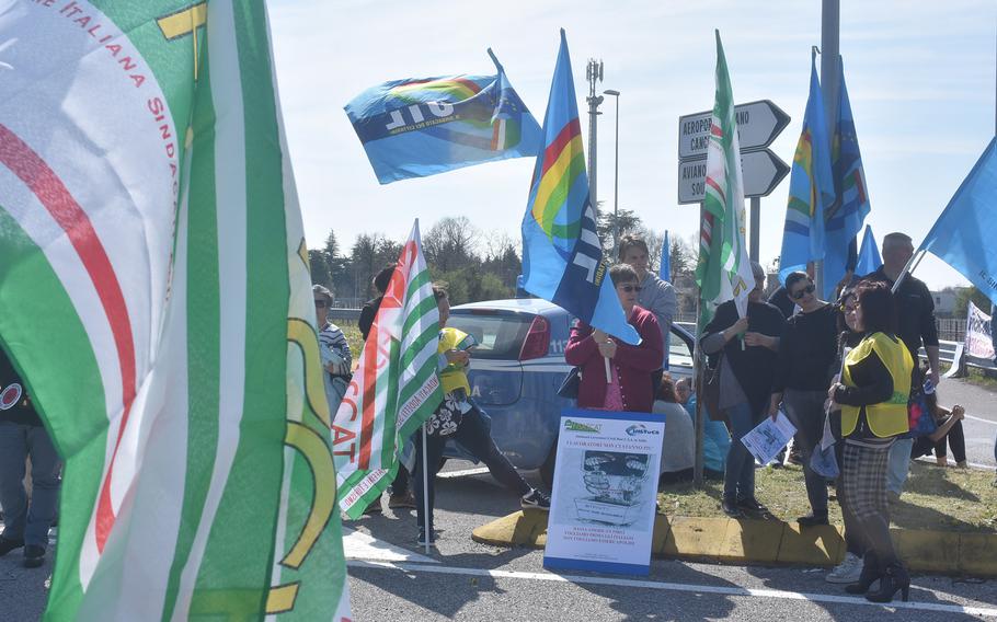 Dozens of Italians demonstrated outside the main gate of Aviano Air Base, Italy, on Saturday, March 30, 2019, calling for the base to adhere to long-standing agreements regarding employment on base. 