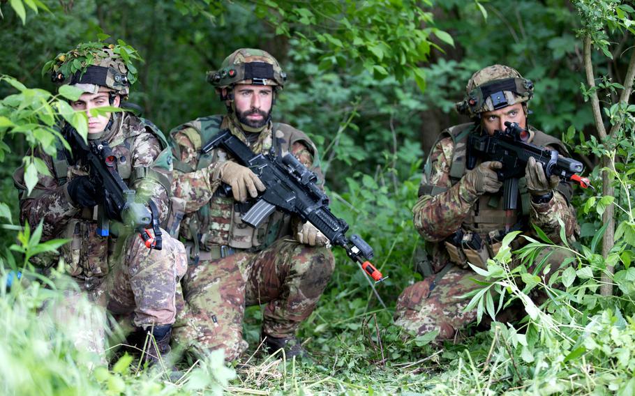 A group of Italian paratroopers pull security during Exercise Immediate Response at Cerklje ob Krki Airbase, Slovenia, on May 14, 2019. The exercise is a multinational drill co-led by Croatian and Slovenian armed forces, and U.S. Army Europe. 

