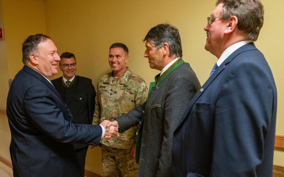 Secretary of State Mike Pompeo is greeted by Brig. Gen. Christopher R. Norrie, Bavarian State Minister Florian Herrmann, Grafenwoehr Mayor Edgar Knobloch and Vilseck Mayor Hans-Martin Schertl as he kicks off a two-day visit to Germany at U.S. Army Garrison Bavaria at Grafenwoehr on Nov. 6, 2019.
