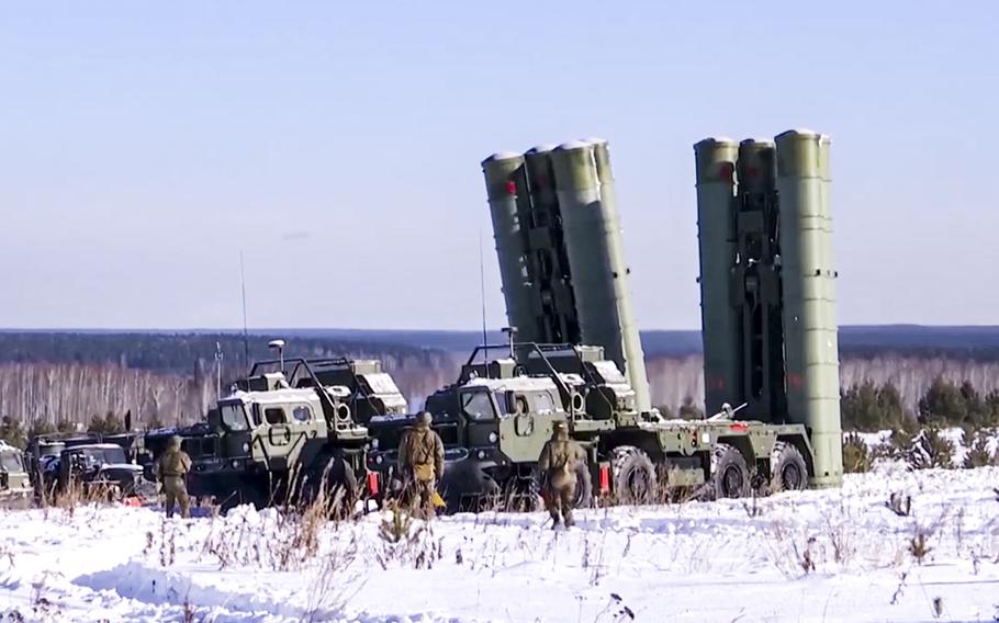 In this photo taken from video and released by the Russian Defense Ministry Press Service on Thursday, Jan. 27, 2022, Russian S-400 Triumf surface-to-air missile systems attend military drills in Sverdlovsk region, Ural, in Russia. Russia and Belarus began their largest joint military drills in years Thursday, watched closely by the U.S. and Europe amid tensions over neighboring Ukraine.