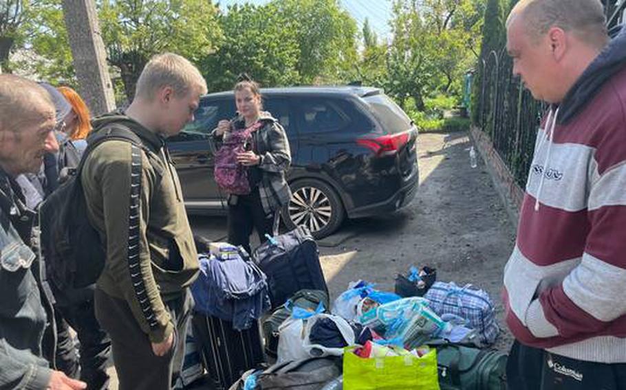 The family of Vyacheslav Todorov, right, in Bakhmut after fleeing the besieged city of Severodonetsk.