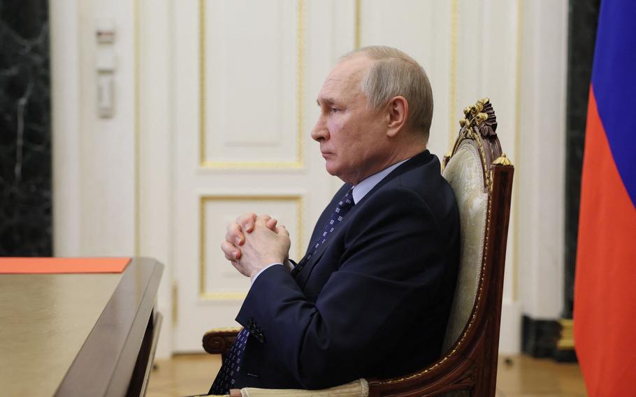 Russian President Vladimir Putin chairs a Security Council meeting via a video link at the Kremlin in Moscow on June 2, 2023. 