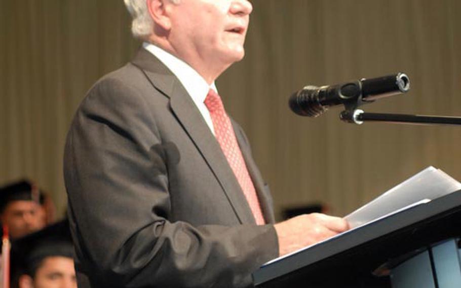 Defense Secretary Robert Gates speaks to a crowd of 124 graduates of Kaiserslautern High School at their graduation ceremony held in the German city&#39;s Fruchthalle building, June 11.