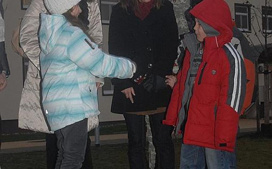 From left: Vinzenz and Lina Ploesner and daughter Simone meet Staff Sgt. Robert Lynn and his wife, Lauren, and children Kaleb and Kaden at Grafenwoehr on Wednesday. The Ploesners are sponsoring the Lynns under a program that will see the two families interact before and during Lynn's upcoming deployment to Afghanistan.