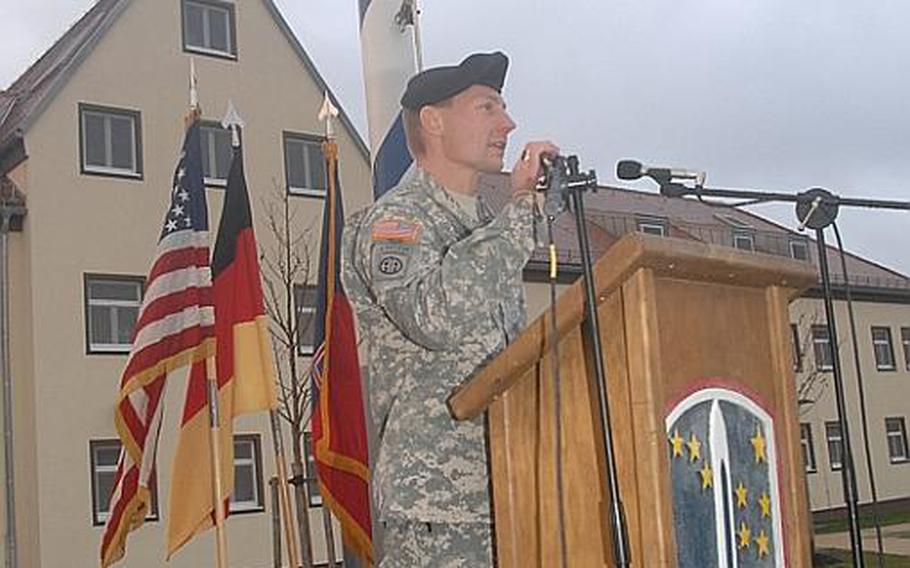 Col. Frank Zachar, the 172nd Infantry Brigade commander, speaks at a ceremony in Grafenwoehr, Germany, on Wednesday during which American and German families participating in a partnership program were introduced to one another.