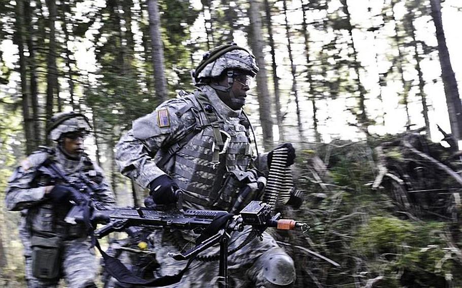 Sgt. 1st Class Zachary N. Balancier, front, and and Pvt. Christian E. Risby  of the 170th Infantry Brigade Combat Team, train in Grafenwohr, Germany, in October. The Defense Department is expected to decide early this year whether to keep the Baumholder-based 170th and the Schweinfurt-based 172nd Infantry Brigade Combat Team in Europe.